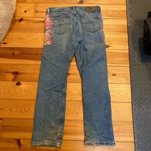 Visibly mended Wrangler fleece lined jeans 32x32